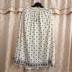 Elegant Cream and Black Patterned Skirt